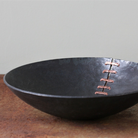 copper and iron stitches bowl