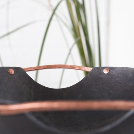 blacksmith made metal bowl with copper handles