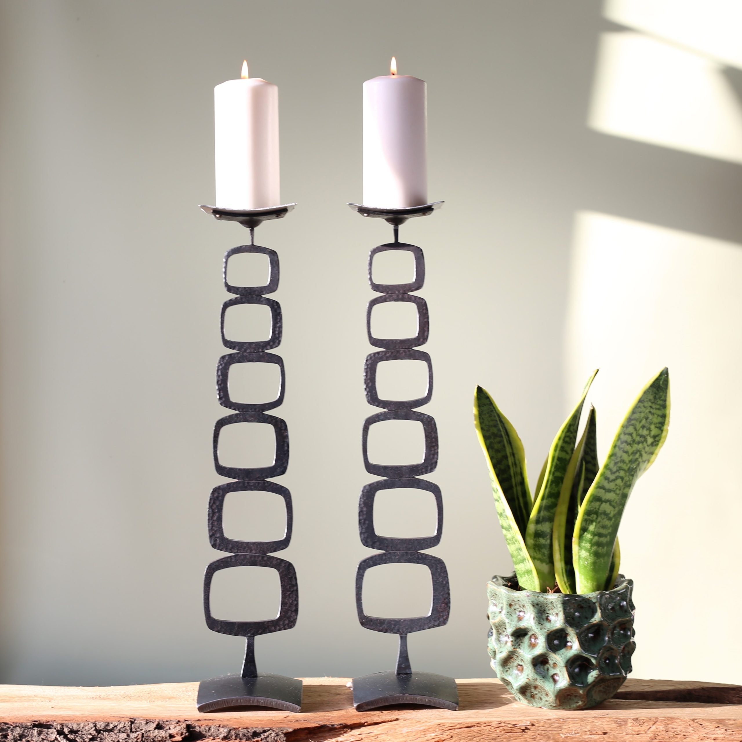 Retro style tall metal candlesticks