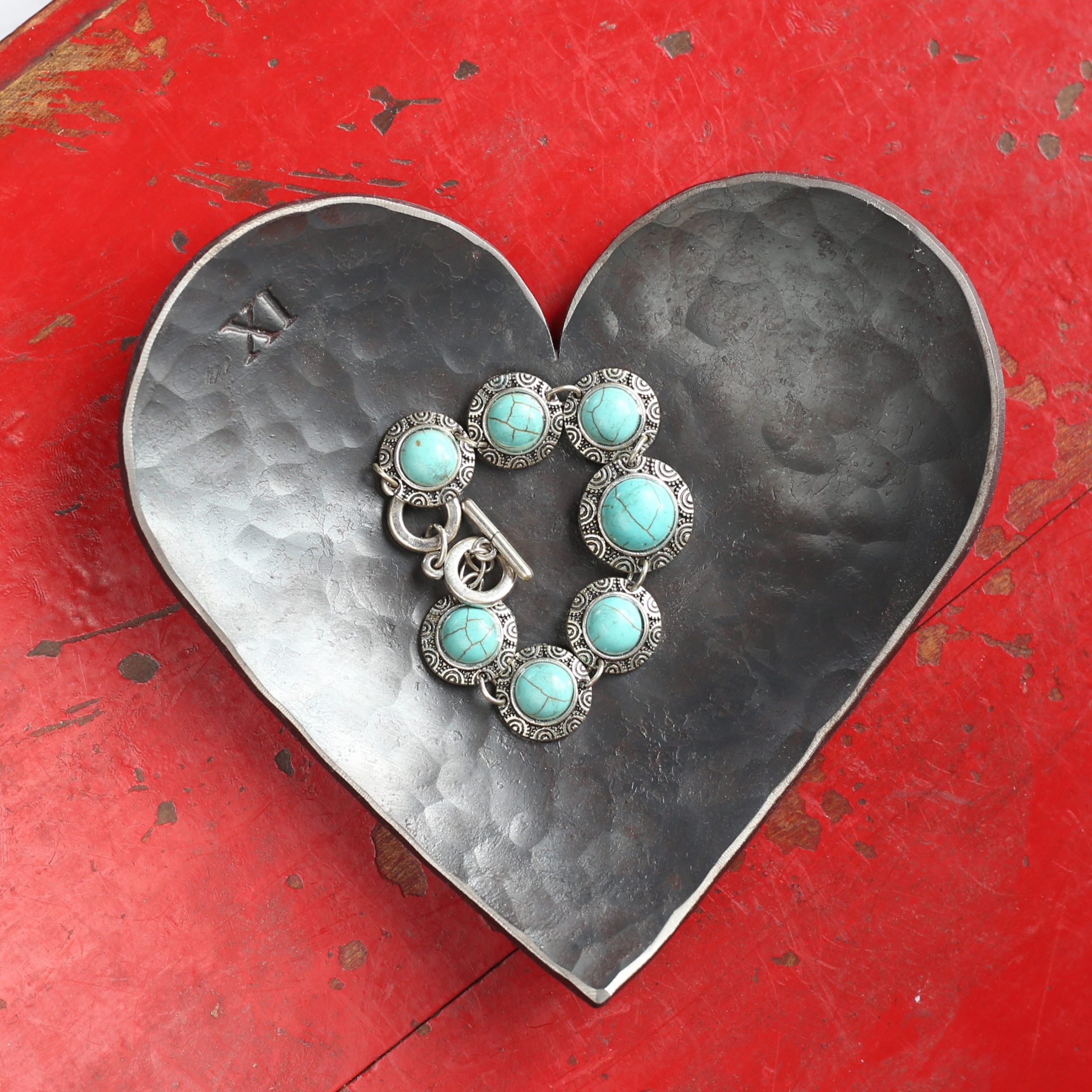 Steel Heart dish with XI stamp. 11th anniversary gift