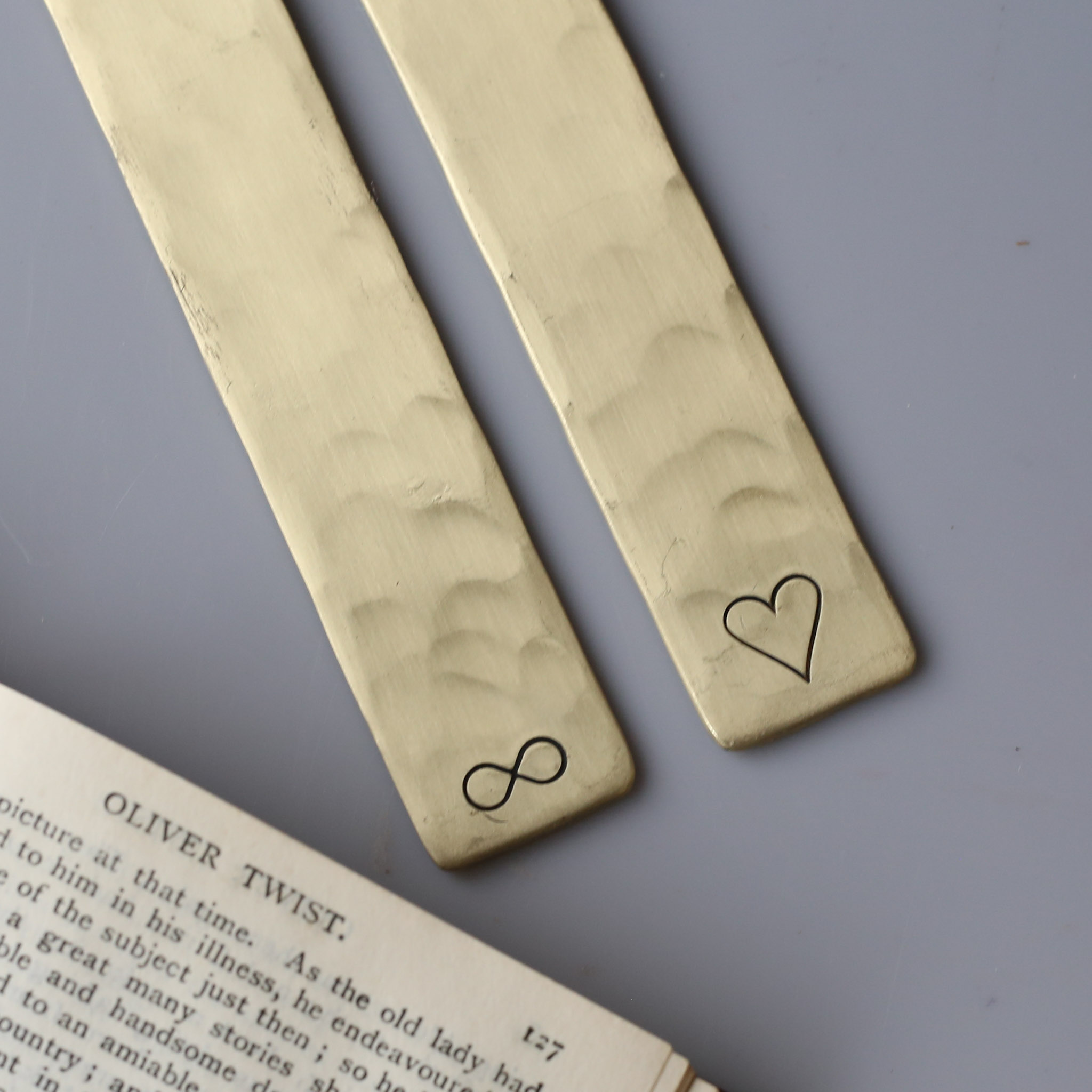 19th Anniv ersary Bronze Bookmark. A Bronze Keepsake lightly hammered solid copper bookmark available in a choice of hand stamped designs. Finished with a choice fo faux suede tassel.